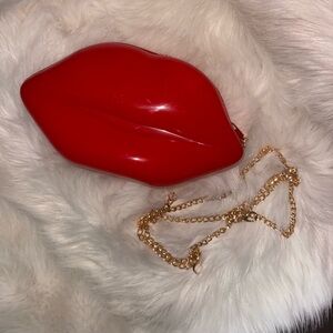 Red Lip-Shaped Clutch with Gold Chain